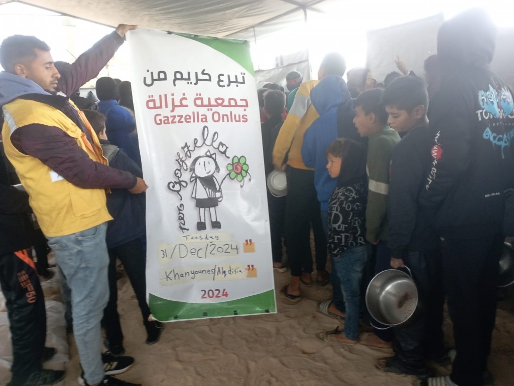 Distribuzione pasti caldi a Kadisiyya, Khan Younes, 31/12/2024