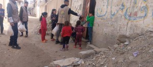 Distribuzione di acqua e pane a Deir al-Balah, 26/3/25