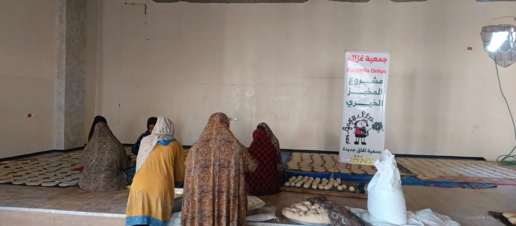 Distribuzione pane e acqua a Nuseirat, 13/4/25