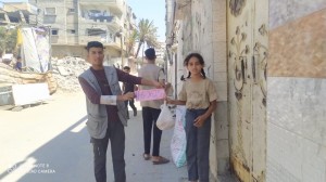 Distribuzione pane e acqua a Nuseirat, 11 e 12/6/25
