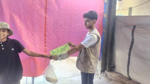 Distribuzione pane e acqua a Nuseirat, 20/7/25