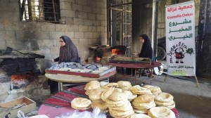Distribuzione pane e acqua a Nuseirat, 30/7/25