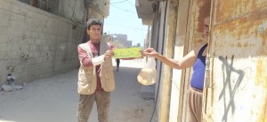 Distribuzione pane e acqua a Nuseirat, 7/8/25