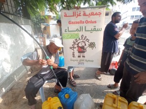 Distribuzione pane e acqua a Nuseirat, 10/8/25